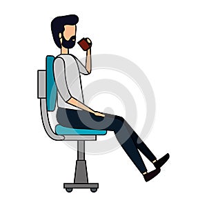 businessman drinking coffee seated in office chair
