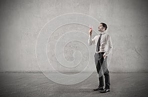 Businessman drinking a glass of wine