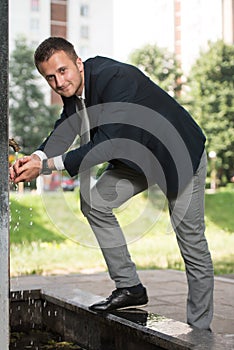 Businessman Drinking Water