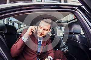 Businessman driving in a car