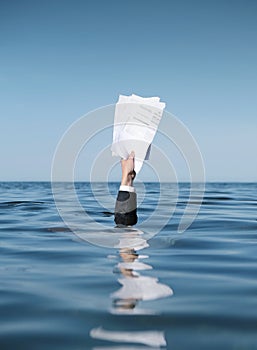 Businessman Drowning in The Sea