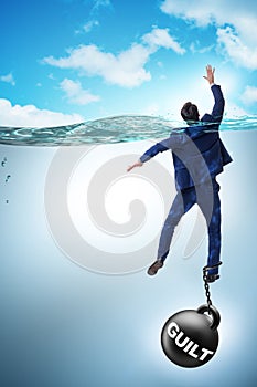 The businessman drowning under the burden of sin and guilt