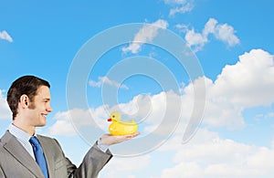 Businessman with duck