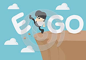 Businessman is an egoist with word ego kicked off the cliff photo