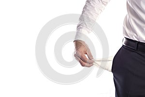 Businessman with empty pockets, man`s hands are holding empty pockets of trousers on a white background with space for text