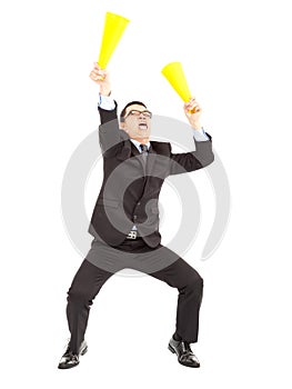 Businessman encouraging with cheering megaphone