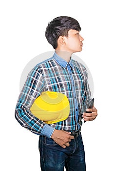 Businessman engineer hold yellow safety helmet plastic and cell phone on white background