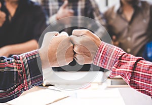 Businessman and engineer working hands of business people join hand together.