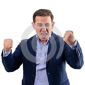 Businessman enjoying himself and shouting for a successful victory