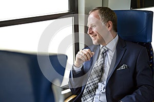 Businessman enjoying his train journey