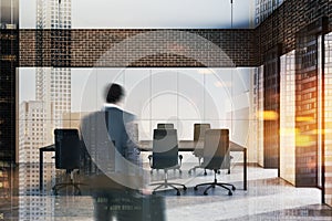 Businessman entering office meeting room