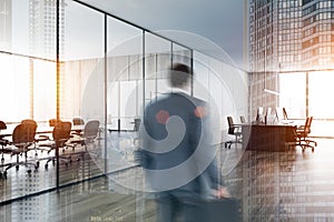 Businessman entering office meeting room