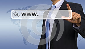 Businessman entering web address