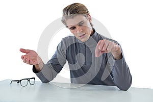 Businessman examining invisible product