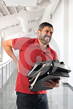 Businessman Experiencing Pain in Lower Back