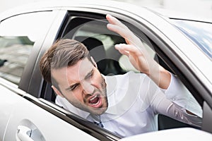 Businessman experiencing road rage