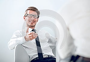 businessman explaining something to his colleague