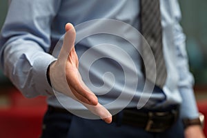 Businessman Extending Hand To Shake