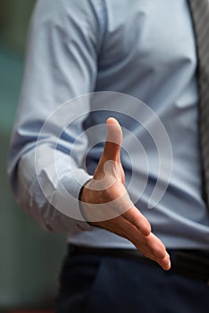 Businessman Extending Hand To Shake