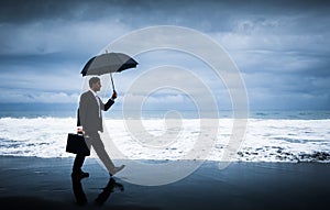 Businessman facing storm