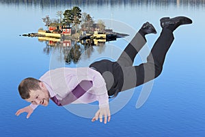 Businessman falling down and sea island in background