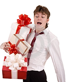 Businessman with falling gift box.