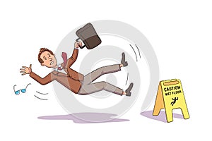 Businessman falling near Caution wet floor yellow sign