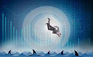 The businessman falling into sea with sharks