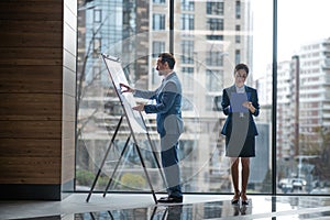 Businessman feeling busy while thinking about financial plan