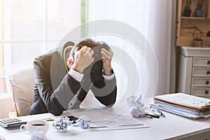 Businessman feeling sick and tired. Businessman who feel stressed out of work in the office
