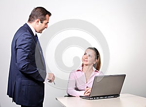 Businessman and female assistant