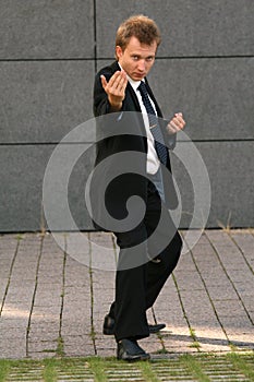 Businessman in fighting position