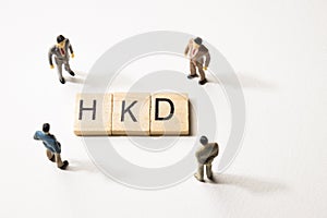 Businessman figures at HKD words