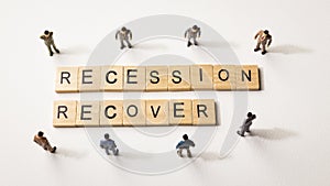 Businessman figures meet recession and recover