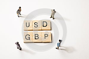 Businessman figures meet USD and GBP