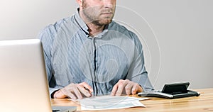 Businessman filling 1040 tax form