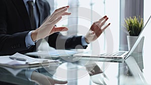 businessman finger typing on computer keyboard in office