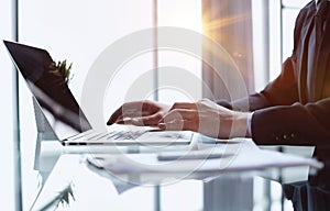 businessman finger typing on computer keyboard in office