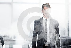 Businessman during fire alarm in office