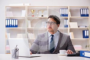 The businessman during fire alarm in office