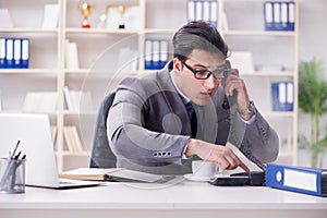 The businessman during fire alarm in office