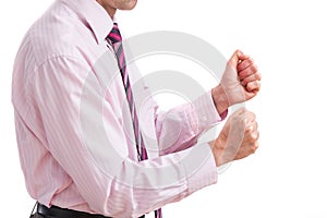 Businessman and fist clenching photo