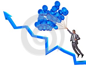 Businessman flying on balloon in challenge concept