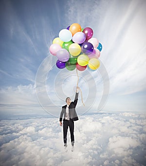 Businessman flying high