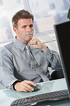 Businessman focusing on task