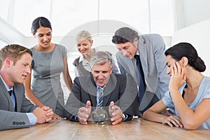 Businessman forecasting the future with his crystal ball