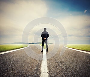 Choices of a businessman at a crossroads. Concept of decision photo