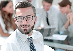 Businessman in front of his business team