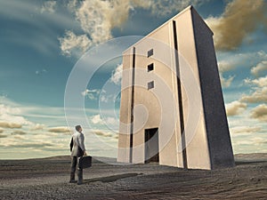 Businessman in front of a large building in a wasteland