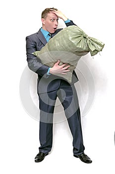 Businessman with garbage trash bag.